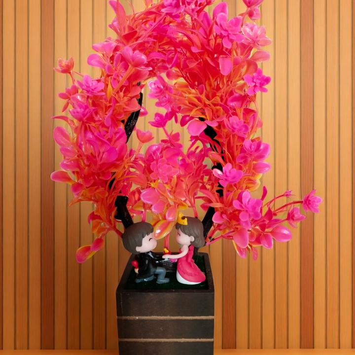 Beautiful Love Couple Under Flower Tree Showpiece – A Symbol of Romance & Togetherness