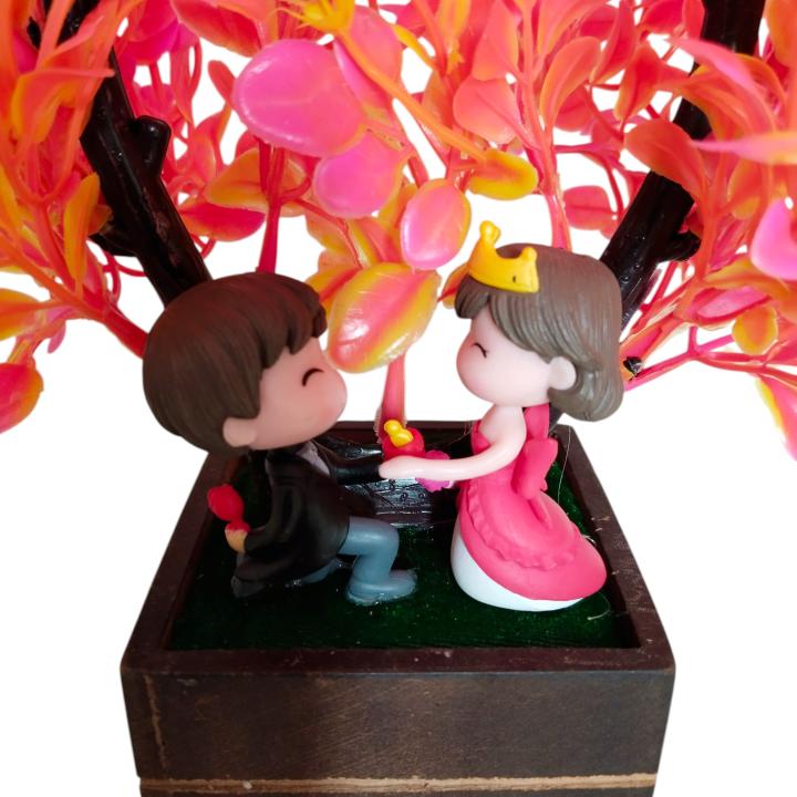 Beautiful Love Couple Under Flower Tree Showpiece – A Symbol of Romance & Togetherness