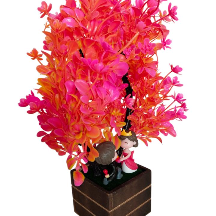 Beautiful Love Couple Under Flower Tree Showpiece – A Symbol of Romance & Togetherness